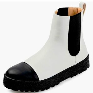 Black and White Booties 
Size 11
Brand New